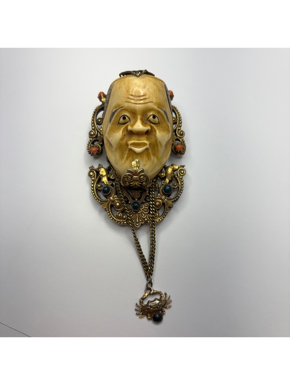 NOH oriental mask brooch with filigree details vintage 50s